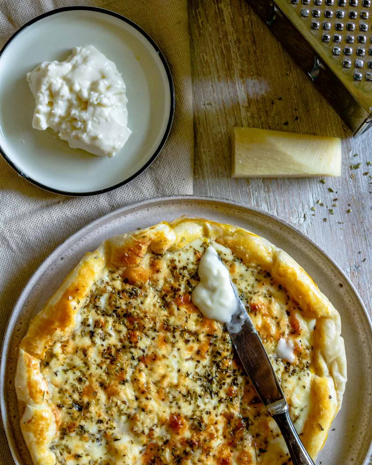 tart, knife with cheese