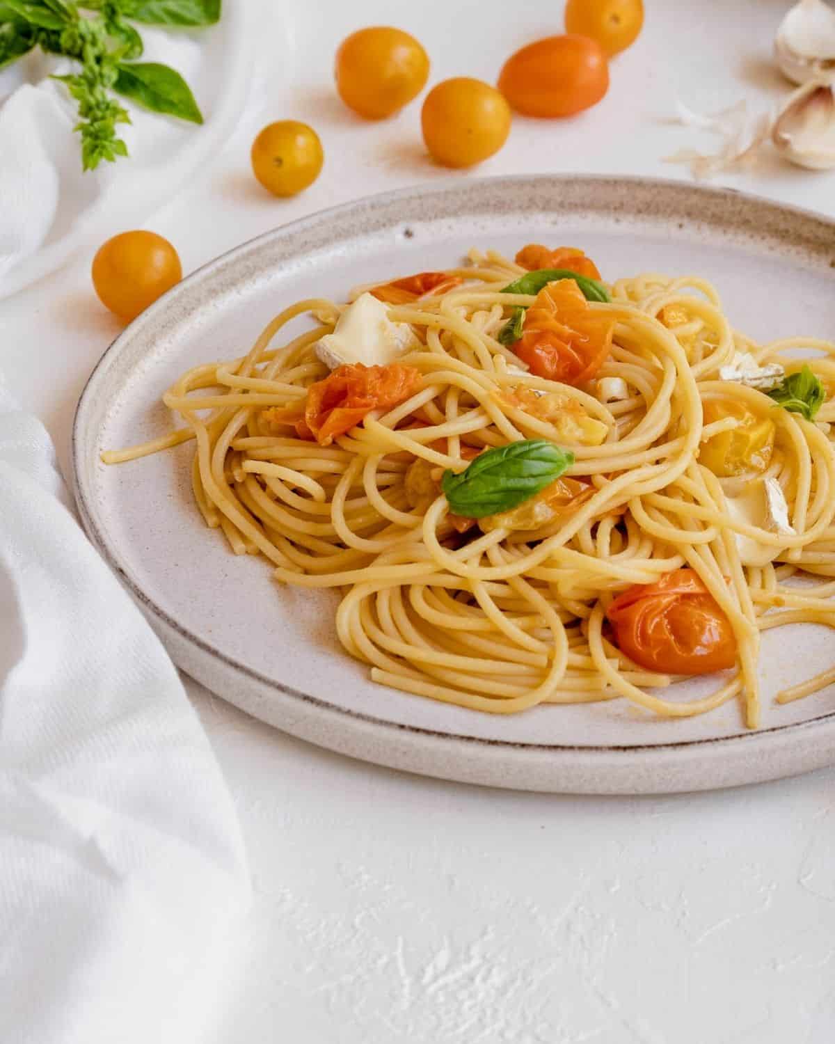 Cherry tomatoes pasta with Brie cheese on top