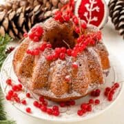 Pumpkin-and-Coffee-Cake-garnished-with-icing-sugar-and-few-redcurrant-berries