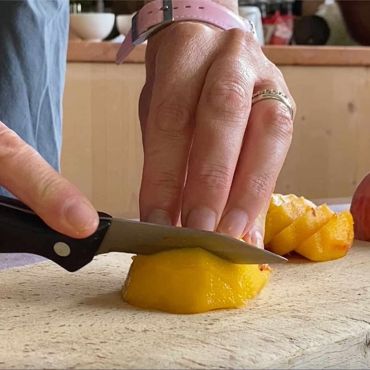 Process shot - slicing peaches