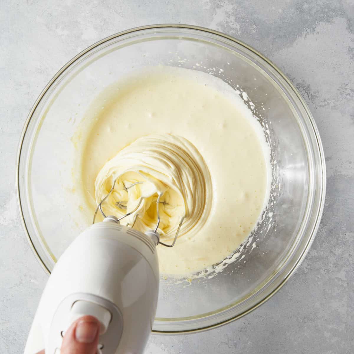 Whisk eggs and sugar with the electric mixer